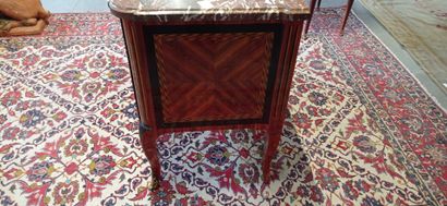 Chest of drawers with a central recess in...