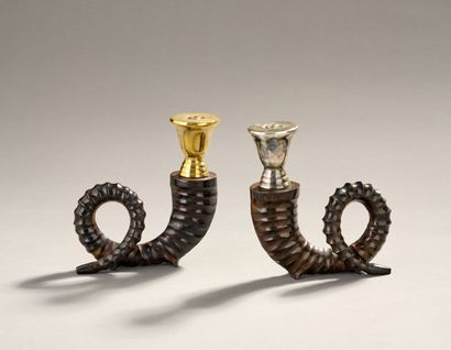 Pair of bronze candlesticks with three patinas...