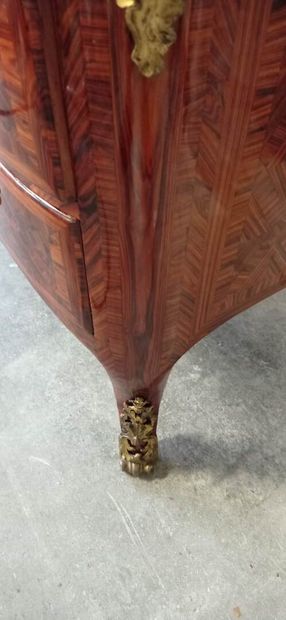 Chest of drawers with a slightly arched front...