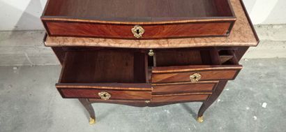 Rosewood and rosewood veneer chest of drawers...