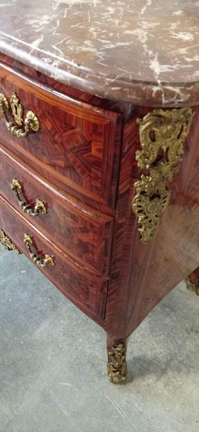 Chest of drawers with a slightly arched front...