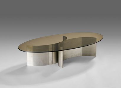 Coffee table made of two arches.
Chrome plated...