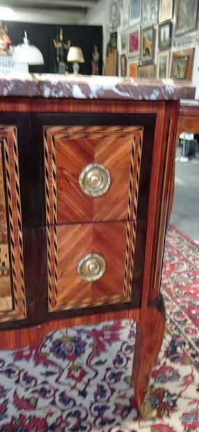 Chest of drawers with a central recess in...