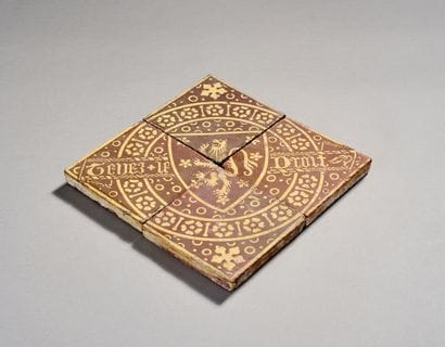 Quatre carreaux en céramique émaillée formant...