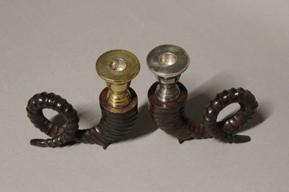 Pair of bronze candlesticks with three patinas...