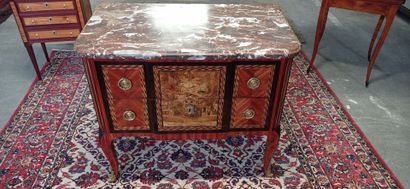 Chest of drawers with a central recess in...