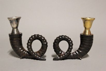 Pair of bronze candlesticks with three patinas...