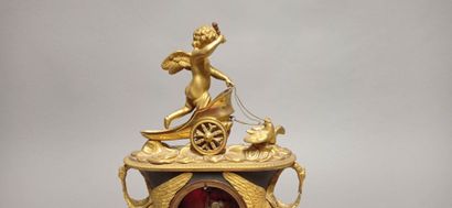 Pendule dite à l'Amour en bronze à deux patines...