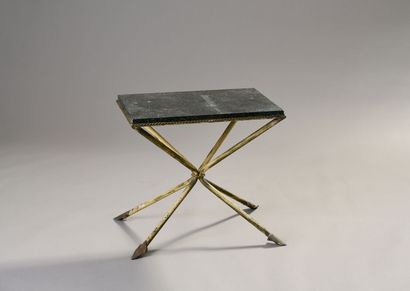Living room table in patinated metal.
Recessed...