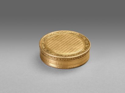 Circular yellow gold box of the XIXth century.
Decorated...