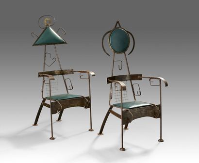 Pair of armchairs in patinated metal of mechanically...