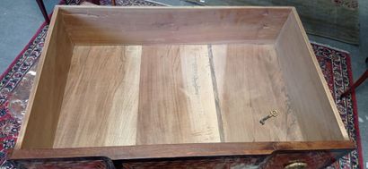 Chest of drawers with a central recess in...