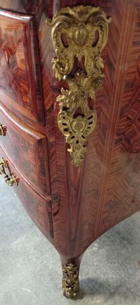 Chest of drawers with a slightly arched front...