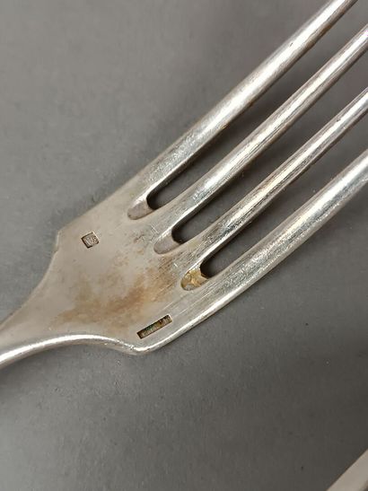 CHRISTOFLE.
Partie de ménagère, modèle uniplat.
Spatule...