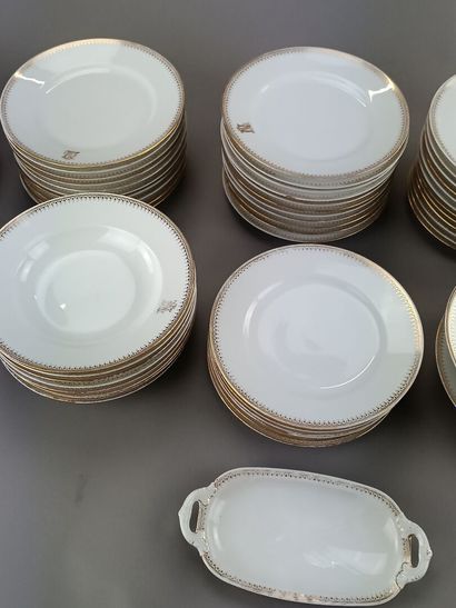 Serving set in white porcelain with gold...