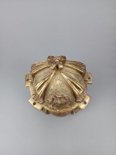 Curious reliquary in carved gilded wood.
Featuring...