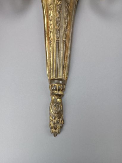 Pair of ormolu and chased sconces with three...