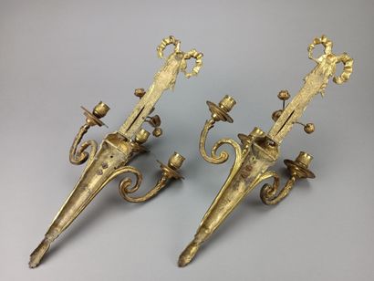 Pair of ormolu and chased sconces with three...