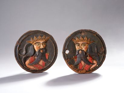 Pair of circular decorative elements in carved...
