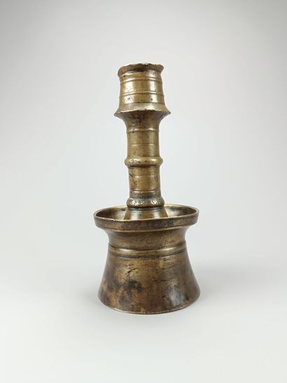 [Art of Islam]
Curious bronze candlestick....