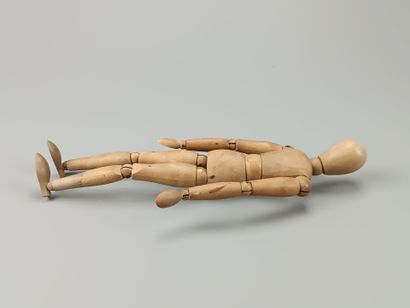 Large fully articulated wooden artist's mannequin.
Early...