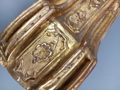 Curious reliquary in carved gilded wood.
Featuring...