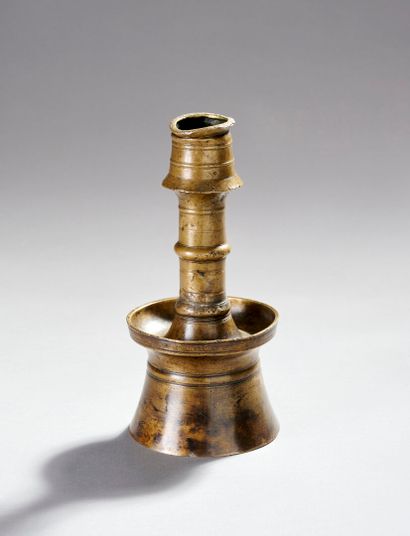 [Art of Islam]
Curious bronze candlestick....