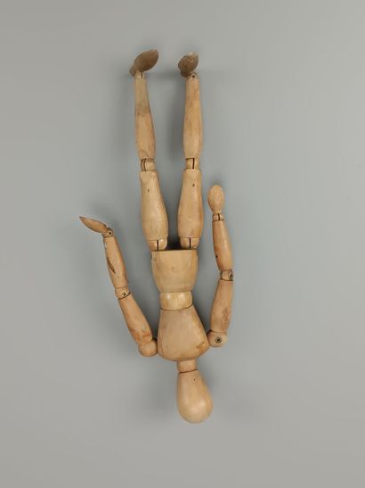 Large fully articulated wooden artist's mannequin.
Early...