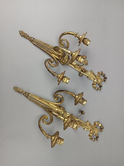 Pair of ormolu and chased sconces with three...