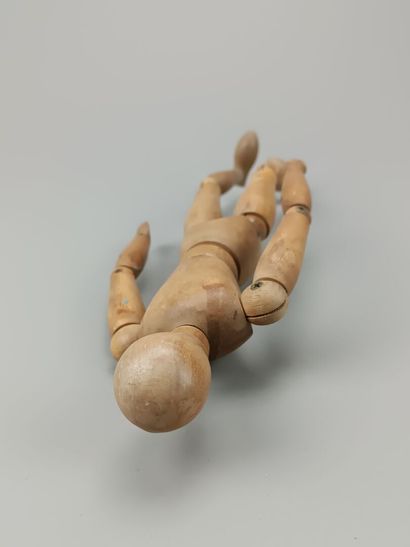 Large fully articulated wooden artist's mannequin.
Early...