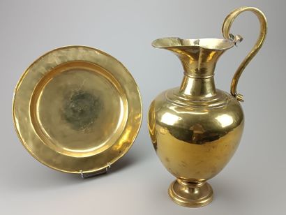 Brass ewer and basin.
The neck is outlined...