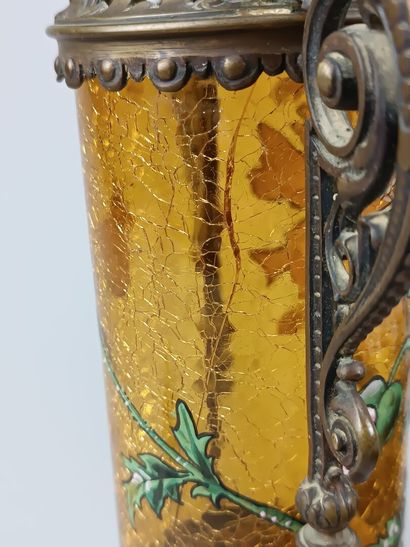 Pair of enameled glass scroll vases.
Decorated...