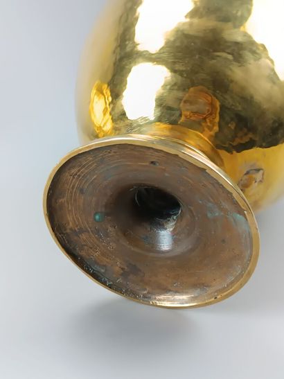 Brass ewer and basin.
The neck is outlined...