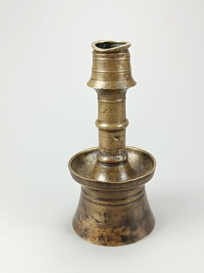 [Art of Islam]
Curious bronze candlestick....