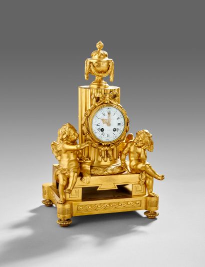 Gilt bronze and chased clock. 
Decorated...