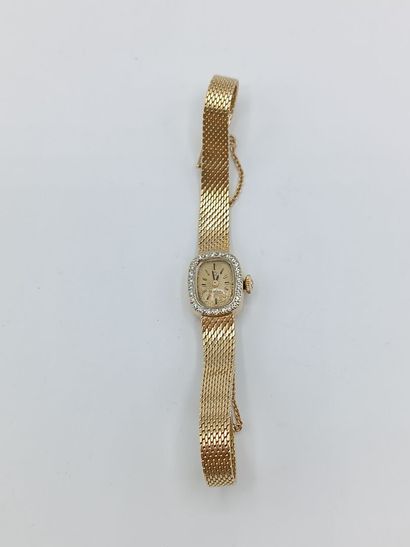 OMEGA, Suisse.
Montre de dame en or jaune...