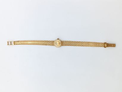 OMEGA
Montre de dame en or jaune 750°° (bracelet...