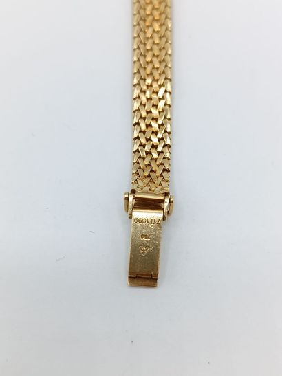 OMEGA
Montre de dame en or jaune 750°° (bracelet...
