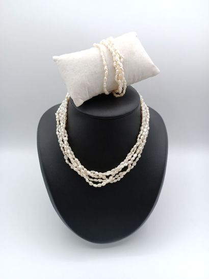 Parure comprenant un bracelet et un collier...