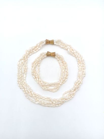 Parure comprenant un bracelet et un collier...