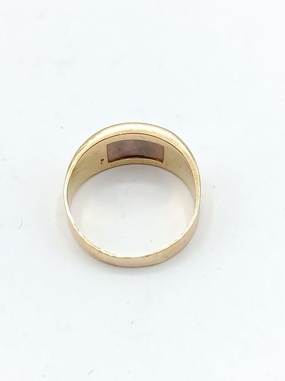 Bague bandeau en or jaune 750°° ornée d'un...