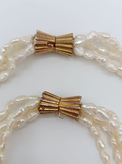 Parure comprenant un bracelet et un collier...