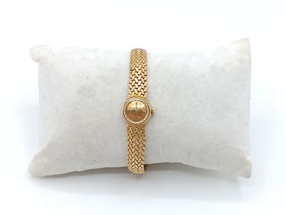 OMEGA
Montre de dame en or jaune 750°° (bracelet...