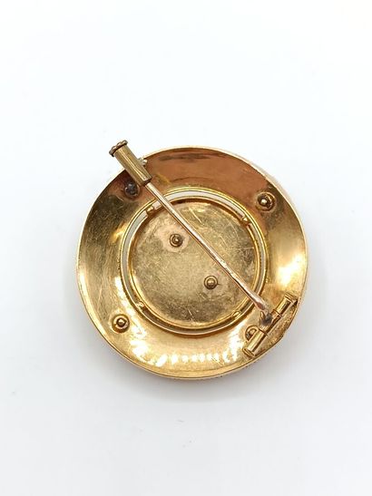 Broche circulaire en or jaune 750°° ornée...