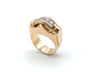 Bague tank en or jaune 750°° et platine 850°°
Le...