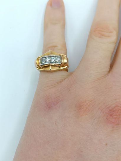 Bague tank en or jaune 750°° et platine 850°°
Le...