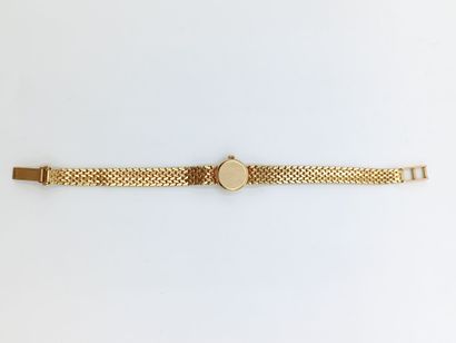 OMEGA
Montre de dame en or jaune 750°° (bracelet...