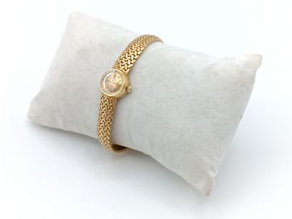 OMEGA
Montre de dame en or jaune 750°° (bracelet...