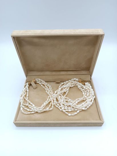 Parure comprenant un bracelet et un collier...