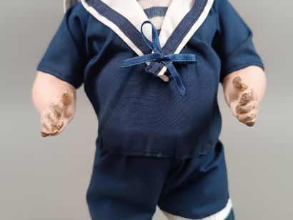 Poupée baigneur, tête en porcelaine, corps...